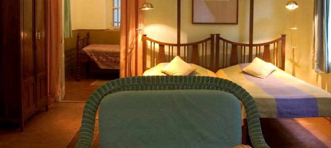 03 A suite with three single beds in two rooms